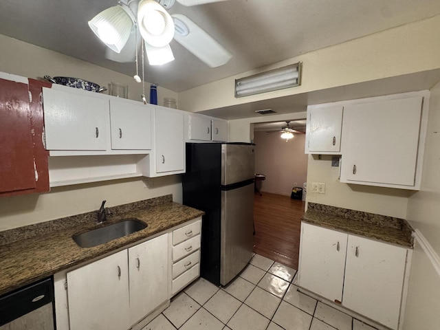 1400 Saint Charles Pl Unit 317, Pembroke Pines, FL 33026 - kitchen with ceiling fan, freestanding refrigerator, a sink, white cabinetry, and light tile patterned floors
