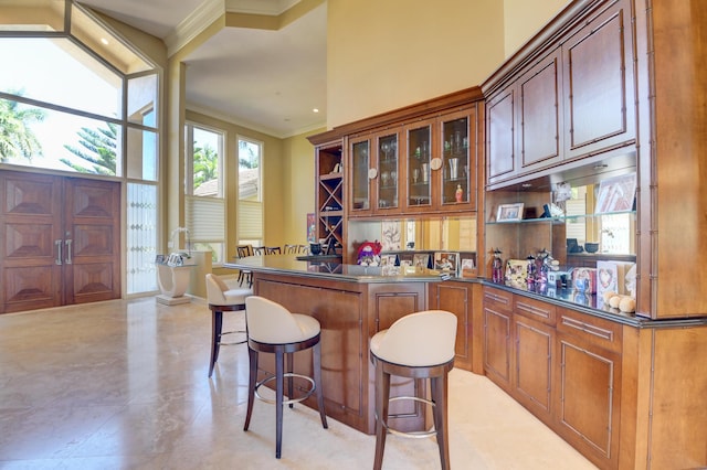 bar with crown molding and recessed lighting