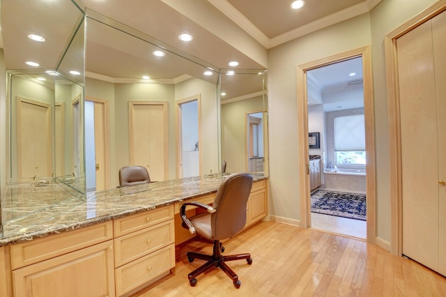 home office with crown molding, recessed lighting, built in study area, and light wood-type flooring