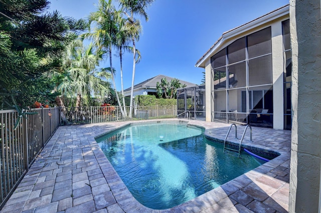 view of pool featuring a patio, a fenced in pool, and a fenced backyard