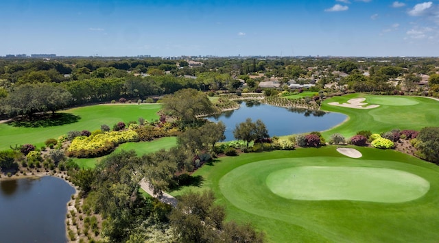bird's eye view featuring a water view and golf course view