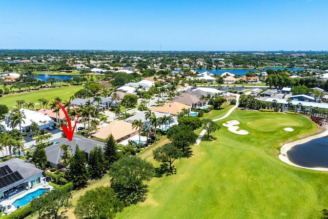 birds eye view of property featuring a residential view, a water view, and golf course view