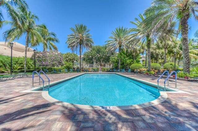 254 Village Blvd Unit 4207, Tequesta, FL 33469 - community pool with a patio area