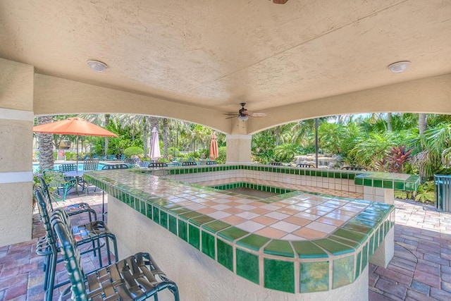 254 Village Blvd Unit 4207, Tequesta, FL 33469 - view of patio / terrace featuring ceiling fan, an outdoor bar, and a pool