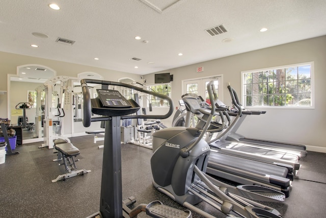 254 Village Blvd Unit 4207, Tequesta, FL 33469 - workout area with a textured ceiling, recessed lighting, and baseboards
