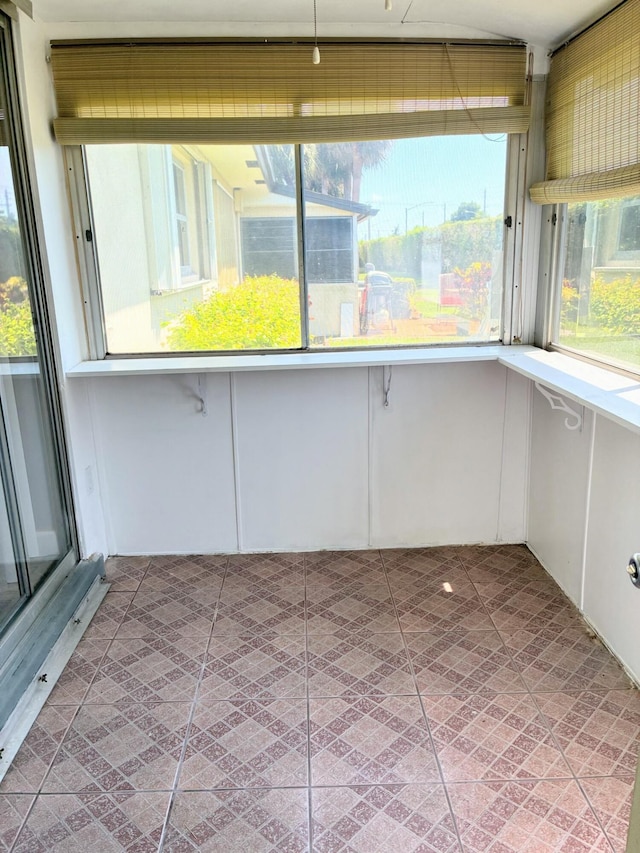 view of unfurnished sunroom
