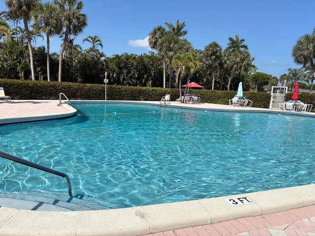 pool featuring a patio area