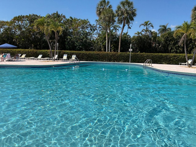 pool with a patio