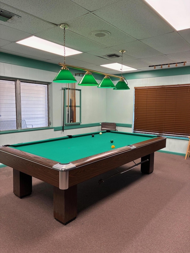 game room featuring visible vents, carpet flooring, and a paneled ceiling