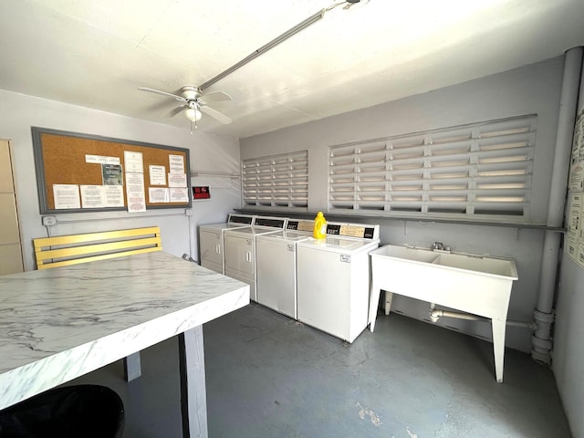 common laundry area with ceiling fan and washer and clothes dryer