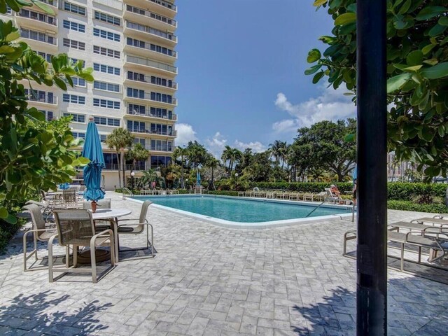 2500 E Las Olas Blvd Unit 802, Fort Lauderdale, FL 33301 - community pool featuring a patio