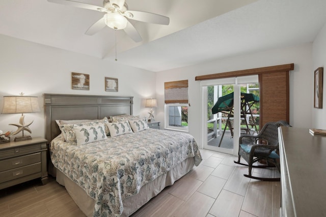 bedroom with access to outside and ceiling fan