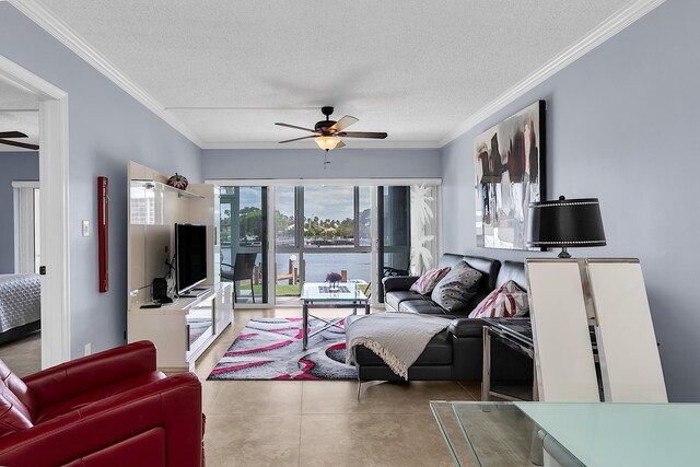 105 NE 19th Ave Unit 164, Deerfield Beach, FL 33441 - living room featuring ceiling fan, ornamental molding, and a textured ceiling