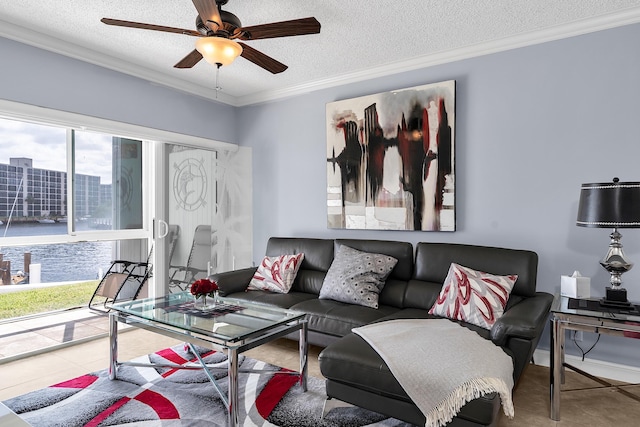 105 NE 19th Ave Unit 164, Deerfield Beach, FL 33441 - living area with tile patterned flooring, a ceiling fan, a textured ceiling, and ornamental molding