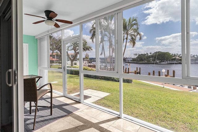 105 NE 19th Ave Unit 164, Deerfield Beach, FL 33441 - unfurnished sunroom with a ceiling fan and a water view