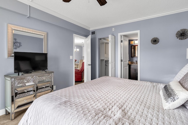 105 NE 19th Ave Unit 164, Deerfield Beach, FL 33441 - bedroom with ceiling fan, ensuite bathroom, a textured ceiling, visible vents, and ornamental molding