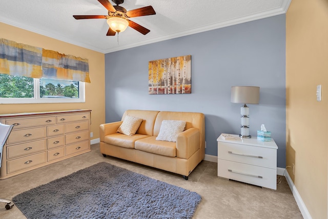 105 NE 19th Ave Unit 164, Deerfield Beach, FL 33441 - sitting room with a ceiling fan, a textured ceiling, ornamental molding, and baseboards