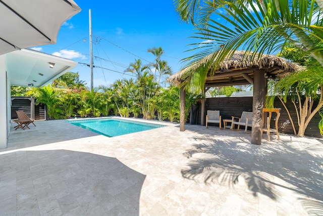 425 32nd St, West Palm Beach, FL 33407 - outdoor pool featuring a patio, fence, and a gazebo