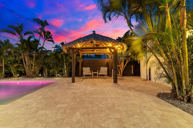 425 32nd St, West Palm Beach, FL 33407 - outdoor pool featuring a gazebo, a patio, and fence