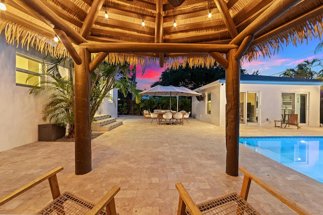 425 32nd St, West Palm Beach, FL 33407 - outdoor pool featuring a gazebo, a patio area, and outdoor dining space