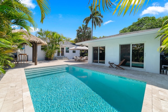425 32nd St, West Palm Beach, FL 33407 - pool featuring a patio area