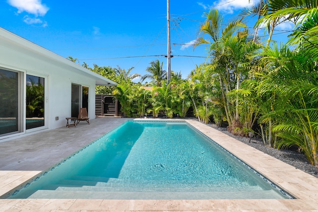 425 32nd St, West Palm Beach, FL 33407 - outdoor pool with a patio area