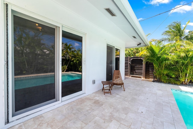 425 32nd St, West Palm Beach, FL 33407 - view of patio featuring an outdoor pool