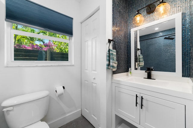 425 32nd St, West Palm Beach, FL 33407 - full bathroom with toilet, vanity, and a shower
