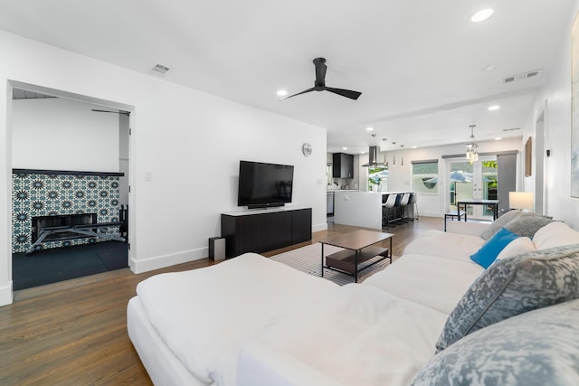 425 32nd St, West Palm Beach, FL 33407 - living room featuring ceiling fan, dark wood-type flooring, baseboards, and recessed lighting