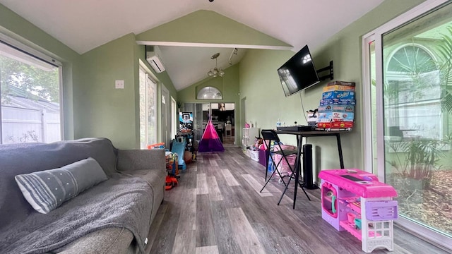 1044 Nin St, Orlando, FL 32835 - living area with lofted ceiling, wood finished floors, and a wall mounted AC
