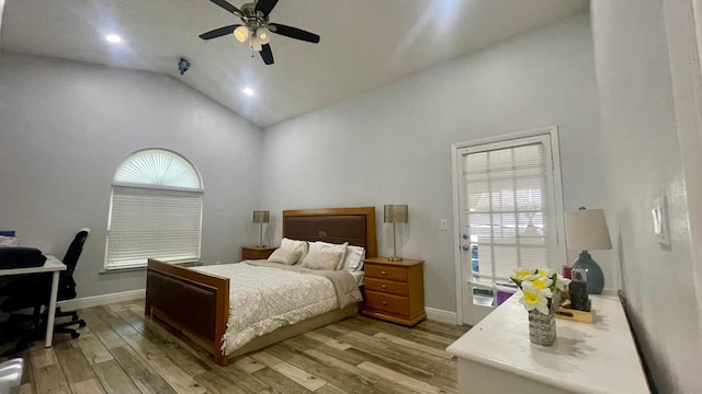 1044 Nin St, Orlando, FL 32835 - bedroom with light wood-style flooring, high vaulted ceiling, multiple windows, baseboards, and ceiling fan