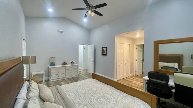 1044 Nin St, Orlando, FL 32835 - bedroom featuring light wood-style flooring, high vaulted ceiling, baseboards, a closet, and ceiling fan