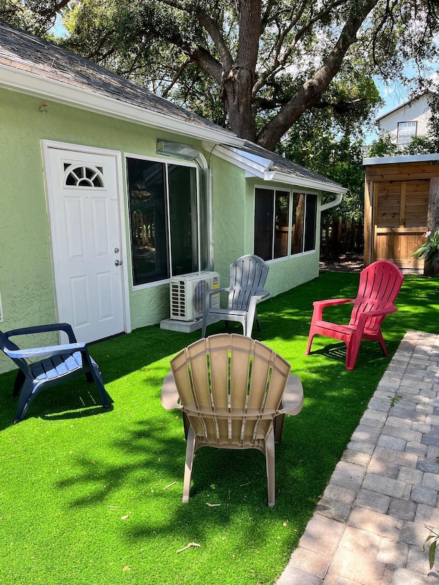 1044 Nin St, Orlando, FL 32835 - view of green lawn with ac unit