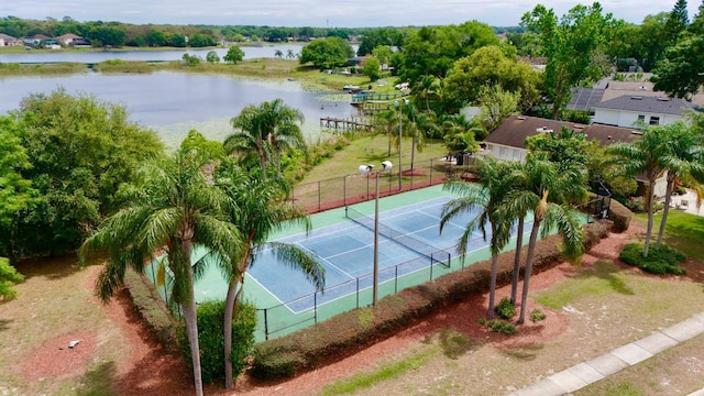 1044 Nin St, Orlando, FL 32835 - view of tennis court featuring a water view