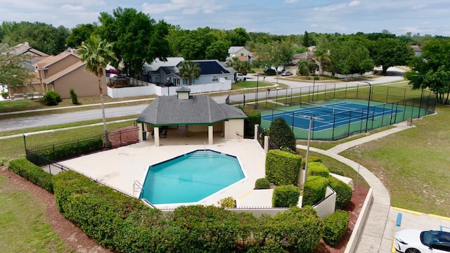 1044 Nin St, Orlando, FL 32835 - view of swimming pool with a tennis court and a residential view