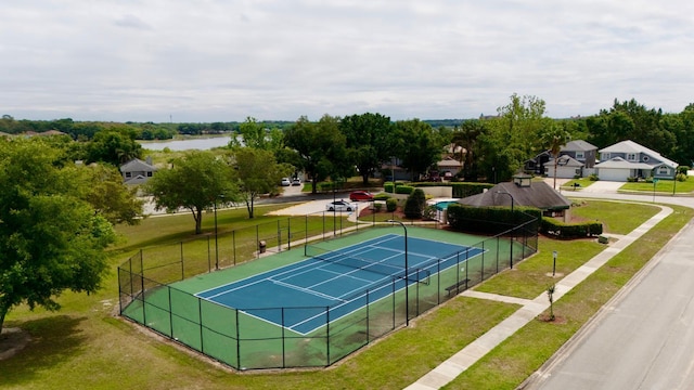 1044 Nin St, Orlando, FL 32835 - view of tennis court featuring a water view