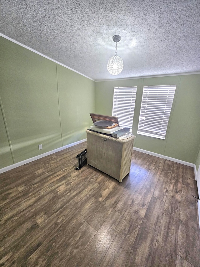 17120 NW 38th Ave, Okeechobee, FL 34972 - office featuring wood finished floors, an inviting chandelier, ornamental molding, baseboards, and a textured ceiling