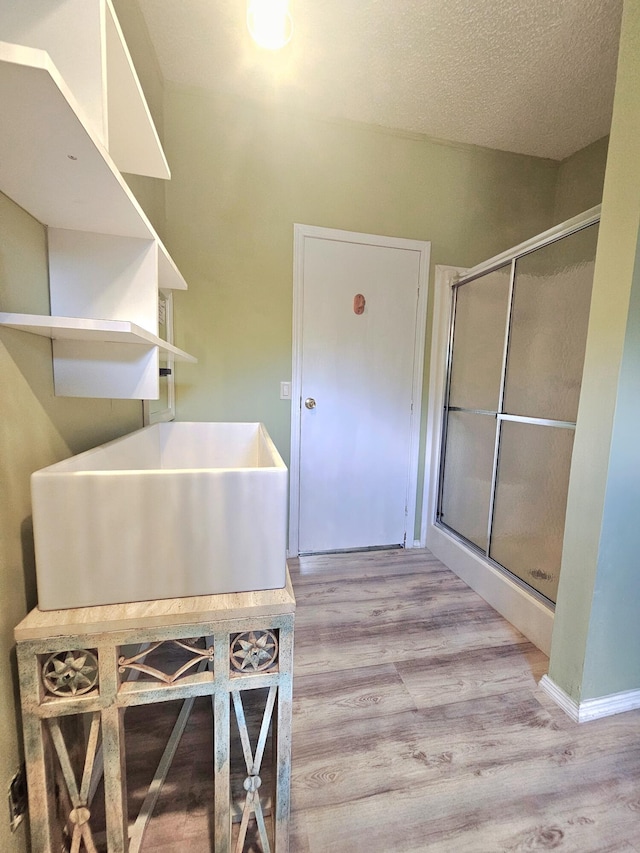17120 NW 38th Ave, Okeechobee, FL 34972 - interior space with a textured ceiling and light wood-type flooring