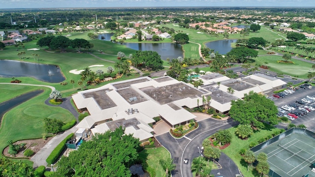 birds eye view of property with a residential view, a water view, and golf course view