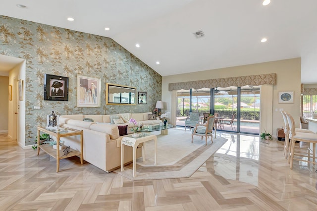 living area with recessed lighting, wallpapered walls, baseboards, vaulted ceiling, and visible vents