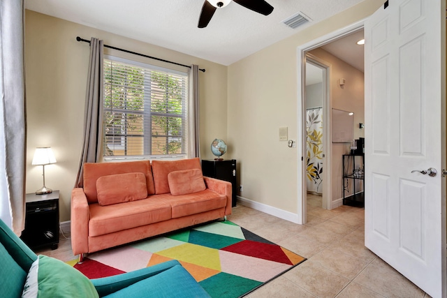 112 Osceola Ln, Jupiter, FL 33458 - living area with a ceiling fan, baseboards, visible vents, and light tile patterned flooring