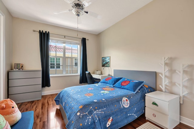 112 Osceola Ln, Jupiter, FL 33458 - bedroom with baseboards and wood finished floors