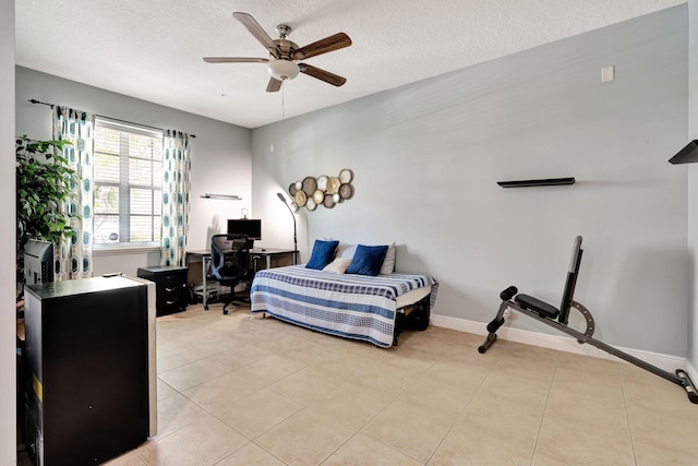 112 Osceola Ln, Jupiter, FL 33458 - tiled bedroom featuring baseboards, ceiling fan, and a textured ceiling