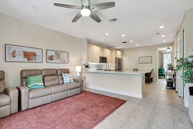 112 Osceola Ln, Jupiter, FL 33458 - living area featuring a ceiling fan, baseboards, recessed lighting, light tile patterned floors, and visible vents
