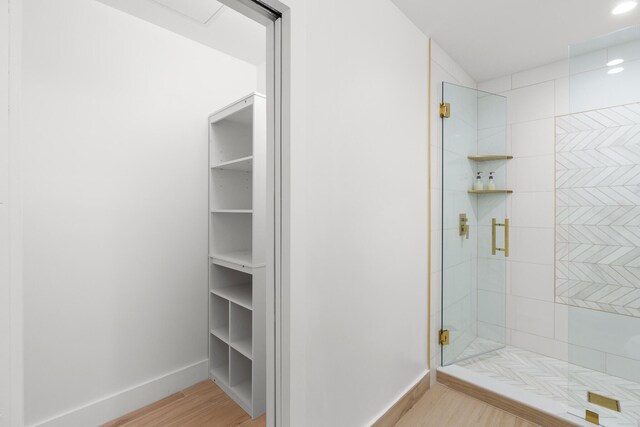 303/305 De Carie, Delray Beach, FL 33444 - full bath featuring recessed lighting, baseboards, wood finished floors, and a stall shower