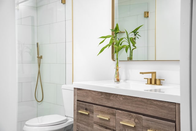 303/305 De Carie, Delray Beach, FL 33444 - full bathroom featuring vanity, a tile shower, and toilet