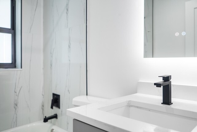 303/305 De Carie, Delray Beach, FL 33444 - bathroom featuring vanity and bathing tub / shower combination