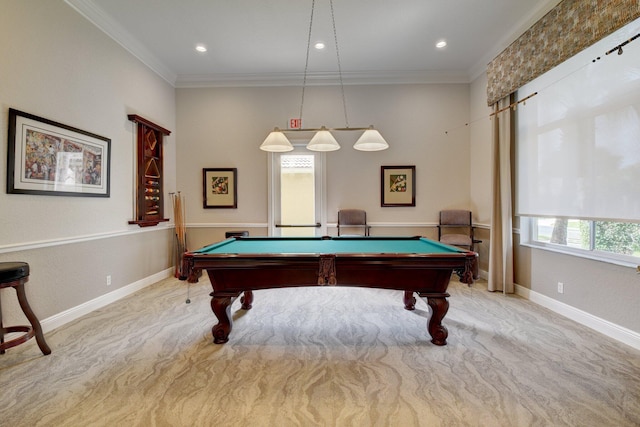 recreation room featuring a healthy amount of sunlight, pool table, crown molding, and light colored carpet