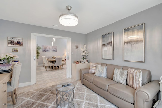 living room featuring baseboards