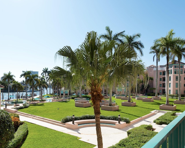 surrounding community with a lawn